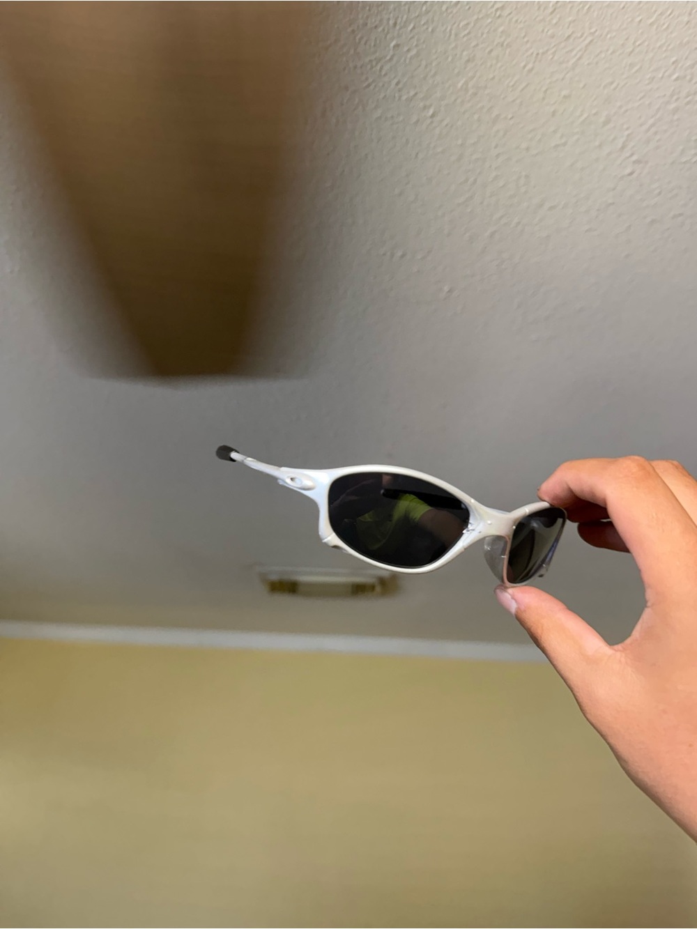 Oakley White Sunglasses with Dark Lenses